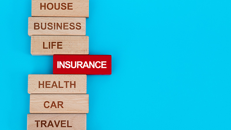 Wooden blocks with the word insurance highlighted.