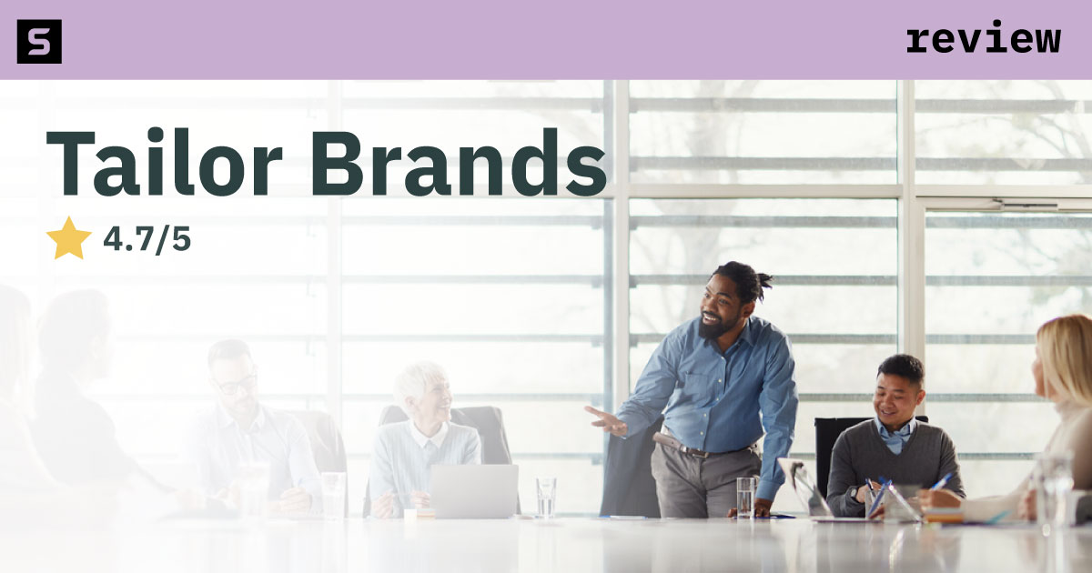 Smiling businessman next to 4 stars and pointing at Tailor Brands logo.