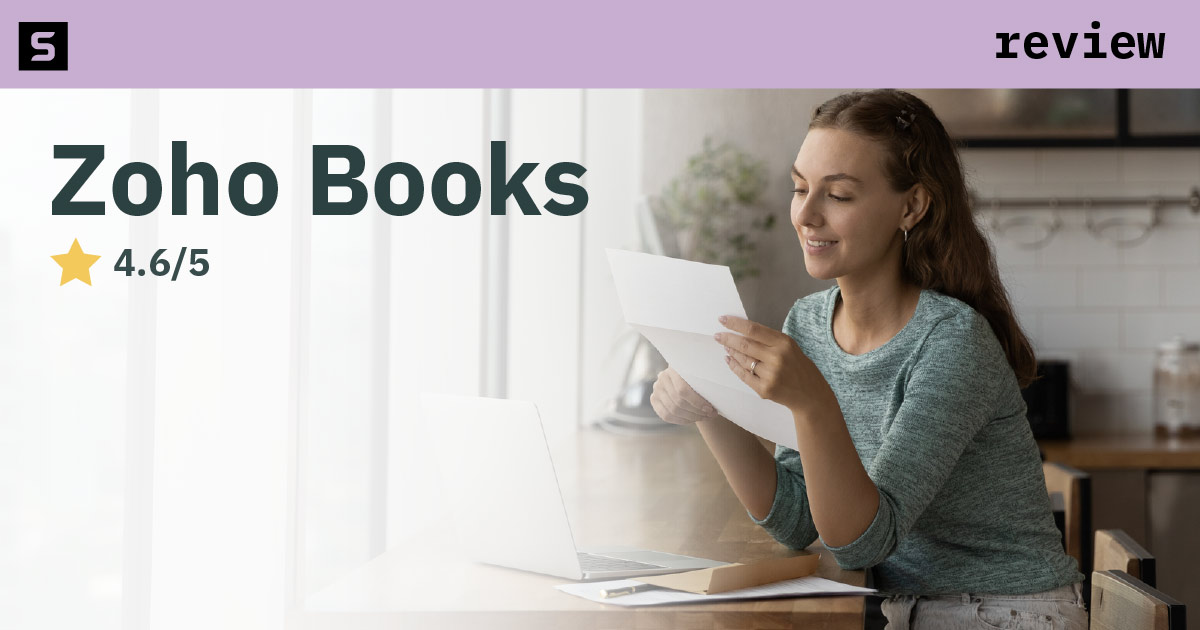 Woman smiling, holding a notebook with text Zoho Books Review.
