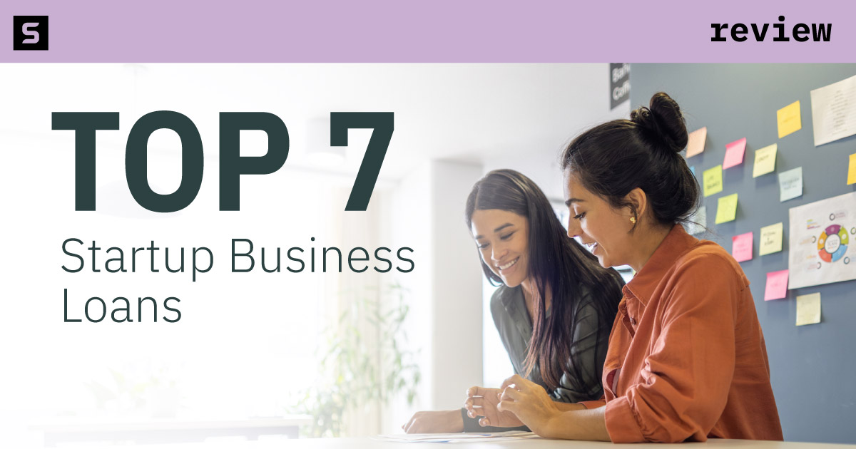 People signing loan paperwork.