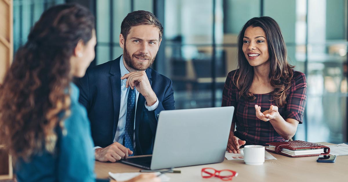 Businesspeople conducting an interview.