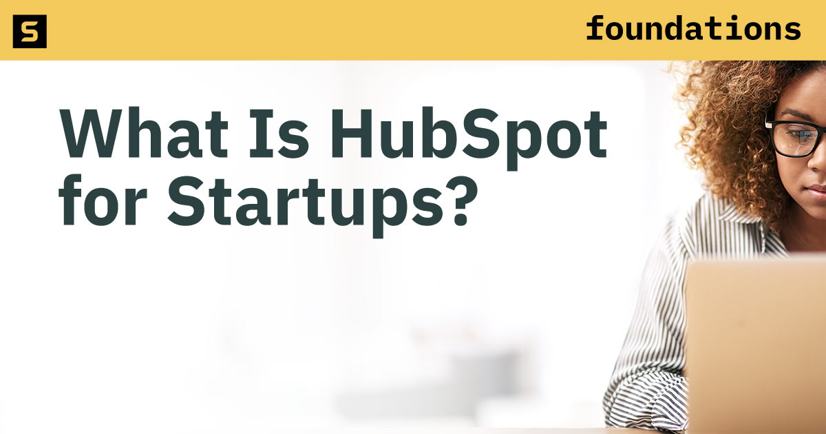 Woman using Hubspot for startups.