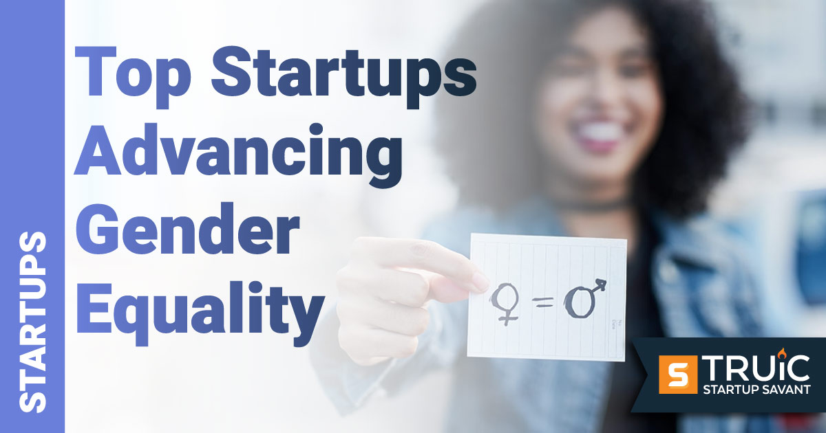 Woman holding gender signs.