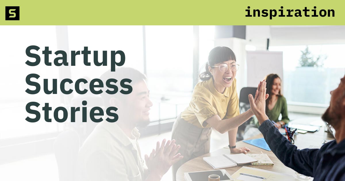 Group of business people high fiving.