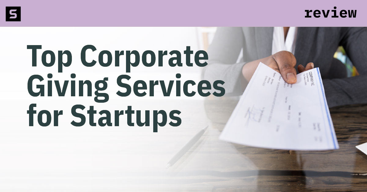 Someone writing a check with the memo Donation.