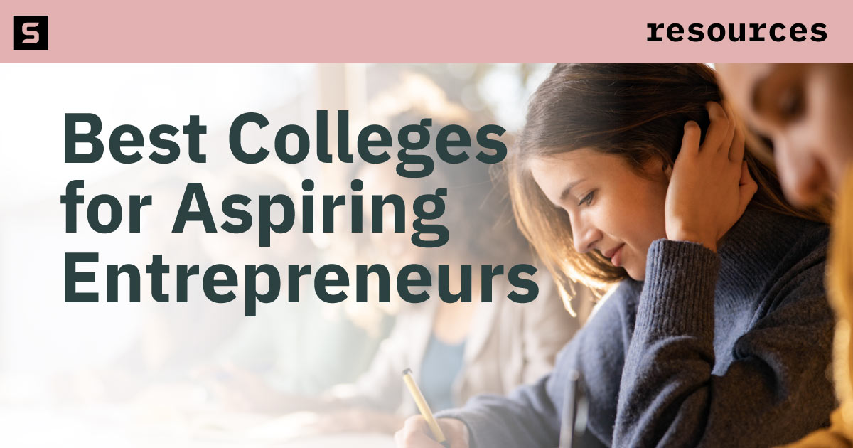 Professor helping college student.